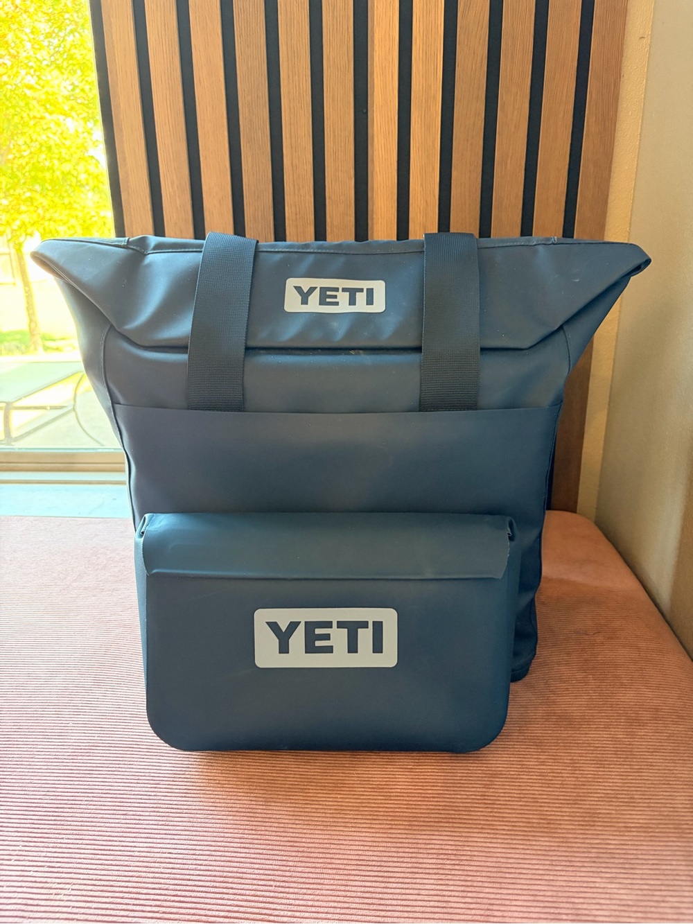 YETI Navy 20L Daytripper insulated tote. With 3L Drybag Sidekick